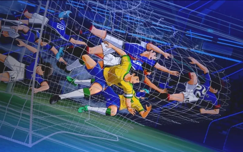Captain Tsubasa II: World Fighters Switch NSP Soccer players in blue and yellow jerseys tangled in the net after a powerful goal in Captain Tsubasa Rise of New Champions