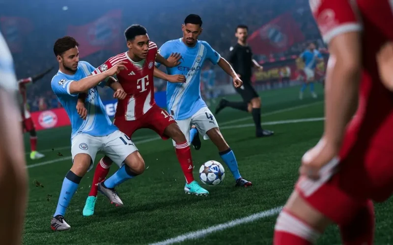EA SPORTS FC 26 Switch NSP Musiala dribbling past Manchester City defenders