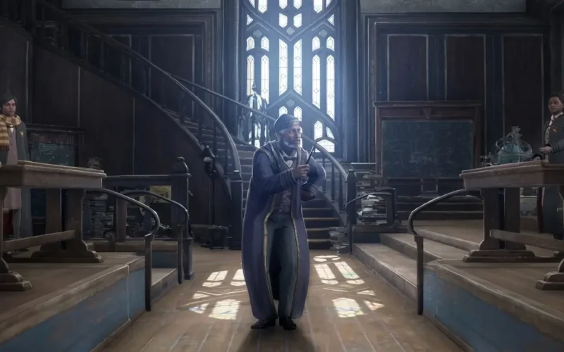 Hogwarts Legacy Deluxe Edition Switch NSP Elderly wizard professor holding a wand in a grand classroom with spiral staircases and stained glass windows